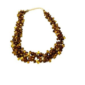 Beaded cluster necklace featuring copper, brown and golden colored beads. EUC